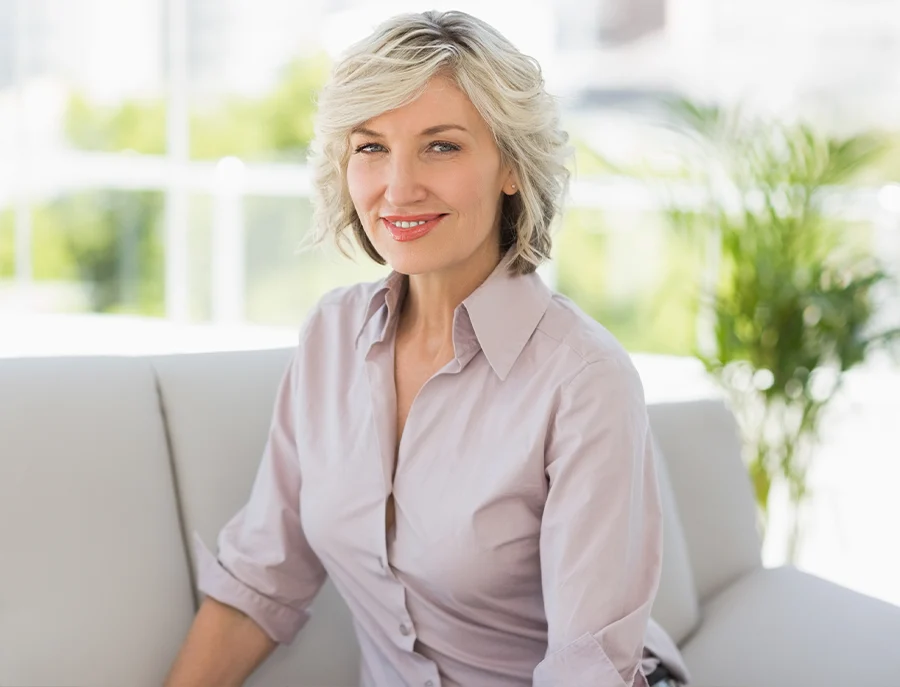 ¡Woman with refreshed, brighter skin after PixelPeel laser resurfacing treatment to improve tone and texture