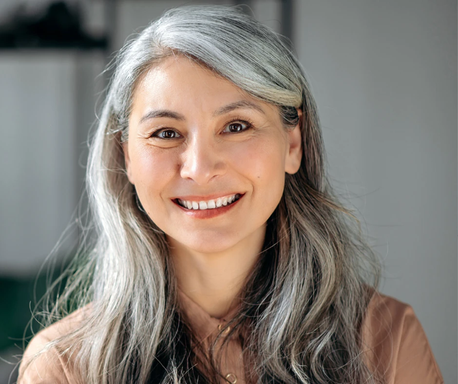 What Is the Best Age for a Facelift?: Smiling woman with gray hair